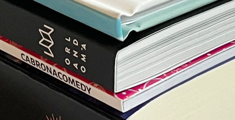 stack of books with binding options