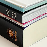 stack of books with binding options