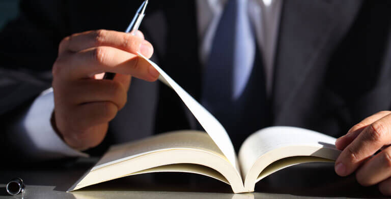 A businessman reading corporate materials