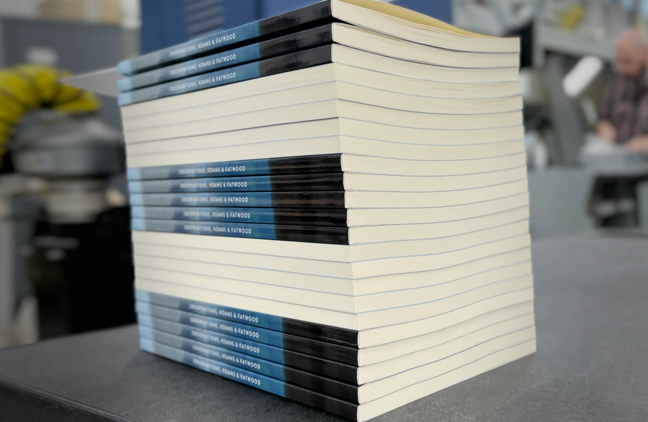 OnPress short run book printing stacked perfect bound paperback books