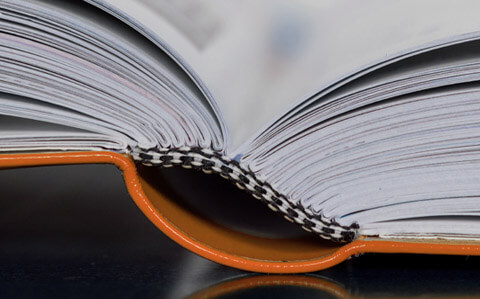 An open book with Smyth sewn binding